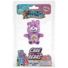 a pink bear toy in the packaging for kids's care bears, which is packaged with