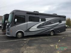 a motor home parked in a parking lot