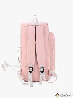 a pink backpack sitting on top of a white floor