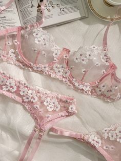 Material: This Pink Cherry Blossoms Sheer Lace 3pc Lingerie Set is made of 95% polyester 5% elastane. This lingerie set includes: 3 Pcs Unlined Underwire Non padded Adjustable shoulder straps Hook and eye closure Adjustable belt Adjustable panty size *We recommend taking measurements before ordering lingerie. Different lingerie brands use different size charts, if you want the lingerie set to fit perfectly, please check the size chart below Details: Sexy Pink Cherry Blossoms Sheer Lace 3pc Linge Spicy Clothes, Lingerie Garter Belt, Flower Lingerie, Soft Fits, Lingerie Cute, Lingerie Brands, Pink Lingerie, Cute Lingerie, Bra Lace