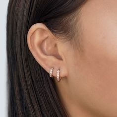 These Rose Gold Vermeil Huggie Hoop earrings will be your favorite everyday pairs. Our Huggies are true to size and will hug your ear perfectly. Great for smaller lobes or second piercings. 14K Rose Gold over Sterling Silver Cubic Zirconia Crystals Hypoallergenic, lead and nickel free Thickness 2mm Inside Diameter Sizes: 6.5mm, 9mm Snap closure #E008-RG Dainty Rose Gold Tarnish-resistant Huggie Earrings, Everyday Rose Gold Cartilage Earrings, Dainty Rose Gold Hypoallergenic Huggie Earrings, Rose Gold Small Hoop Huggie Earrings For Everyday, Rose Gold Tarnish-resistant Dainty Huggie Earrings, Dainty Rose Gold Sterling Silver Huggie Earrings, Rose Gold Tarnish Resistant Huggie Earrings, Hypoallergenic Rose Gold Huggie Earrings, Tarnish Resistant Rose Gold Huggie Hoop Earrings