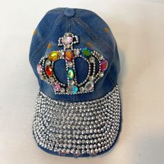 This Hat Is Meant For The Queen In You... And Your Not Afraid To Flaunt It! All The Stones Are In Tack And This Cap Is In Euc This Would Also Make A Great Gf Gift. This Hat Could Be A Cutom Piece Denim Snapback Hat One Size, Denim Snapback Hat One Size Fits Most, Denim Baseball Cap One Size, Blue Denim Baseball Cap With Curved Brim, Denim Visor Hat, One Size Fits Most, Denim Snapback Baseball Cap For Spring, Denim Visor Hat One Size, Denim Visor Hat One Size Fits Most, Blue Denim Visor Hat