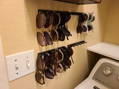 This is a sunglasses or glasses holder that holds 6 glasses per unit. It measures 7" x 0.6" (177.8mm x 15mm) and sticks out from the wall 1-1/5" (30.6mm). It mounts to the wall with standard drywall screws or screws of similar size. This should fit most glasses. Each order comes with 2 screws and 1 Sunglasses Holder. Eyeglasses Storage Ideas, Sunglasses Organization, Diy Sunglasses Holder, Sunglass Storage, Eye Glass Holder, Sunglasses Storage, Sunglasses Holder, Glasses Cases, Drywall Screws