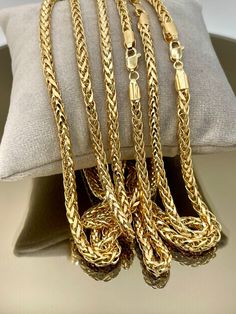 --- Created in GURANTEED HIGH QUALITY 18-Karat SOLID GOLD --- Not Gold Filled or Plated! At a 3 and 3.5 millimeter thickness this chain is available in 22" lengths. 3mm   12.62 gr Weight 3.5mm 16.83 gr Weight * 18k solid gold pieces are made to last forever. Solid 18K gold jewelry is the most expensive and high quality option as it doesn't rub off or flake, and doesn't tarnish. Solid gold actually increases in value over time, and has the best resale value. 18K gold is richer and more vibrant in Luxury Gold Plated Wheat Chain Necklace, Luxury 14k Gold Chain Necklace In Gold-tone, Luxury Gold-tone Polished Chain Necklace, Luxury Gold-tone Chain Necklace With Polished Finish, Luxury 14k Gold Tarnish-resistant Chain Necklace, Heavy Chain, 18k Gold Jewelry, Precious Jewels, Gold Piece