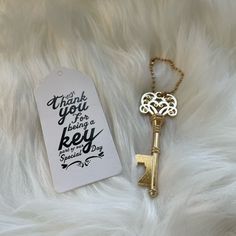 a gold key with a thank you for being a key to someone's day