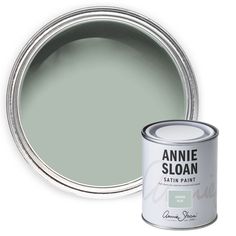 the annie sloan satin paint in sage green is next to an open can of it