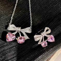 Such a sweet and temperamental set decoration, the design of bowknot cherry, and the overall bowknot is even more sparkling with large pink zircons slightly inlaid with zirconium, so that the matching of necklace and ring set will save you the trouble of matching. Cherry Necklace, Set Decoration, Pink Doll, Bow Necklace, Necklace Ring, Paparazzi Jewelry, Pink Bow, Cute Pink, Save You