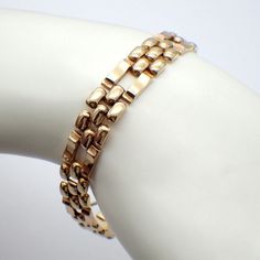 Retro style Finnish 14k (.585) yellow gold chain bracelet, date marked for 1946, Helsinki. Maker's initials - OL. This stately bracelet is 7 5/8" long, 10 mm wide, weighing 11.8 grams. EA5317 Timeless Gold Link Bracelet For Formal Occasions, Timeless Formal Gold Link Bracelet, Timeless 14k Gold Chain Bracelet For Formal Occasions, Classic Gold Jubilee Bracelet With Rectangular Links, 14k Gold Bracelets With Rectangular Links For Formal Occasions, Timeless Hallmarked Gold Bracelet, Formal 14k Gold Bracelet With Box Chain, Timeless 14k Gold Bracelet With Rectangular Links, Timeless Gold Bracelet With Oval Link For Formal Occasions