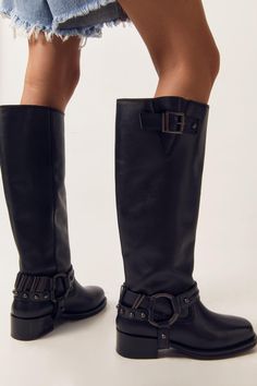 Down here. Feel comfortable and confident in our knee high boots, made in high quality real leather, with a buckle strap, made in high quality real leather. Pairs well with mini dresses and shorts for summer looks that will take you from casual days out to festival weekends to happy hour catch ups, and with jeans or leather pants in winter. Tarnished Leather Buckle Harness Knee High Boots High Quality Real Leather Unique Harness Accent Statement Knee High Length Buckle Strap Accent Easy Pull-On Design Shorts For Summer, Boots High, Leather Buckle, Days Out, Mini Dresses, Fashion Face, Summer Shorts, Boot Shoes Women, Happy Hour