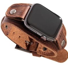 "Leather Apple Watch Cuff   Watch is a sample. Cuff doesn't come with a watch. Put your own Apple Watch size. Our small strap first 37\"-42\" watches and our bigger strap fits larger watches of sizes   44\"-45\".    We got it only in brown & black. Buckels to fit all sizes.   The cuff is high quality leather and DOES'NT come with a watch. Just purchase the right size and you're watch should snap in the metal connection perfectly.    Order with confidence and receive it soon with our fast USA shi Vintage Adjustable Apple Watch Band, Vintage Adjustable Apple Watch Band Rectangular, Adjustable Brown Apple Watch Band, Vintage Adjustable Bracelet Strap Apple Watch Band, Brown Adjustable Apple Watch Band, Adjustable Vintage Bracelet Strap Apple Watch Band, Adjustable Brown Watch With Black Band, Adjustable Leather Strap Cuff Watch Bands, Adjustable Leather Cuff Watch Bands