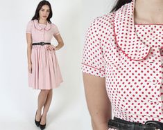 "This is a darling vintage 1950s day party dress. It features a tailored bodice with button up chest and short sleeves. The dress has a gathered waist and a full skirt. Made of a mid weight white polka dot cotton material. Material at neck can unsnap to have just a deep scoop neckline. Sold in great, pre-owned vintage condition. Please review detailed measurements below for an accurate fit. size estimate: S shoulders: 14.5\" bust: 34\" waist: 26\" hips: - total length: 37\" Model is 5'9\" and measures 36\" bust, 25\" waist, 34\" hips. Belts/accessories are not included unless noted in the description * Visit the shop * https://www.etsy.com/shop/americanarchive" 1950s Style Vintage Dress With Short Sleeves, 1950s Style Fitted Vintage Dress With Short Sleeves, Short Sleeve Rockabilly Dresses For Vintage Fashion, Red Short Sleeve Dress For Vintage Fashion, Red Vintage Fashion Dress With Short Sleeves, Red Short Sleeve Vintage Dress, Red Vintage Fitted Dress With Short Sleeves, Fitted Short Sleeve Rockabilly Vintage Dress, Rockabilly Short Sleeve Vintage Dress