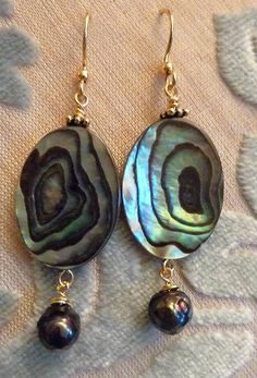 oºૐºooºૐºooºૐºooºૐºo These are adorable eye catching earrings! Can be worn with just about any color since the abalone will reflect the colors you have on. Created with sterling silver or 14k gold filled wire and handcrafted ear hooks These earrings are approx: 1 1/2 inches in length total. Elegant Handmade Iridescent Earrings, Elegant Handmade Abalone Shell Earrings, Elegant Abalone Shell Teardrop Earrings, Elegant Abalone Shell Earrings For Pierced Ears, Elegant Abalone Shell Pierced Earrings, Elegant Teardrop Abalone Shell Earrings, Unique Iridescent Pierced Earrings, Unique Iridescent Earrings, Iridescent Mother Of Pearl Jewelry With Matching Earrings