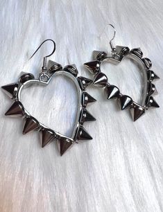 These awesome spiked earrings are part of our new Valentine's Day Collection. It's packed full of beautiful pieces.  These are  Silver hearts with shiny spikes all the way around on small silver hooks.