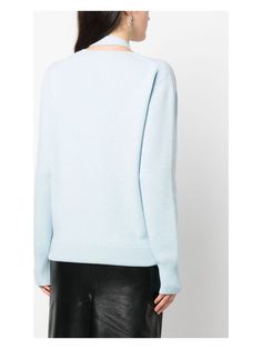 Get ready to cozy up in style with this luxurious cashmere cardigan from Fendi. With its light blue and black knit design and cut-out detailing, this cardigan is the perfect blend of classic and modern. The V-neck, concealed front fastening, and ribbed cuffs and hem add the perfect finishing touches to this must-have wardrobe staple. Wool blend for ultimate softness and warmth Intarsia-knit logo for a touch of designer flair Drop shoulder and long sleeves for a relaxed, comfortable fit | Fendi W Cardigan For Women, Knit Logo, Contrasting Trim, Fall Winter Wardrobe, Leather Cap, Mens Gloves, V Neck Cardigan, Cashmere Cardigan, Denim Pant