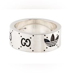 Brand New In Box. 100% Authentic Gucci X Adidas Sterling Silver Logo Ring Ring Size 8 Equals 4.5us Style- 702764 J8400 023 0728 Awesome Gucci X Adidas Ring Made Of Sterling Silver Ring. Semi Shiny Silver (I Magnified The Photos To Show The Size And Markings) Comes Exactly As Shown In Photos. Includes Everything Shown. Box, Jewelry Pouch And Papers. Retail $495 Plus Tax Gucci X Adidas, Gucci Jewelry, Silver Logo, Box Jewelry, Shiny Silver, Wide Bands, Ring Ring, Jewelry Pouch, Womens Jewelry Rings