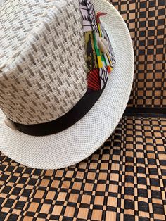 The wow fedora. This artful fedora will bring excitement to your outfit. Don't delay order yours today. Cowrie Shell, All White Mens Outfit, Cool Hats, African Hat, African Hats, Kente Cloth, African Mud Cloth, Fancy Hats, Men Hats