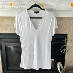 White, Inc Deep V Neck Tee Shirt! Longer Length (Approx 27 1/2” From Shoulder To Hem). The Deeper V Neck Is Very Flattering! Basic V-neck Summer Shirt, White Stretch V-neck Shirt, Teal Shorts, Studded Shorts, Black Lace Shorts, Sequin Tee, Womens Black Shorts, Long Tee, Grey Tie Dye