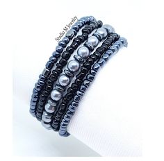 Black & Grey Stretch Bracelets, Hematite Stone Stacking Bracelets, 5 Loose Mix Match Bracelets, Gray Jewelry, Holiday Jewelry Gift 6mm gray glass pearls and 6mm Hematite stone stretch bracelet with 4mm black and hematite glass stretch bracelet set.  You will receive 5 loose bracelets #B21 Wanna See More? Click below for other items available: http://www.etsy.com/shop/StudioMJewelry Shipping: All jewelry pieces are ready to ship. Items are shipped to your Etsy address, via USPS First Class mail w Match Bracelets, Stone Stacking, Gray Jewelry, Jewelry Holiday, Stacking Bracelets, Hematite Stone, Grey Glass, Holiday Jewelry, Bracelet Stack