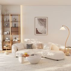 a living room filled with furniture and a large white couch in front of a book shelf