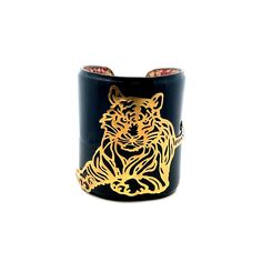 Unusual 14K Yellow Gold Patent Leather Tiger Cuff Bracelet  A perfect gift for your loved one!  Total Cuff Weight: 29.94g Cuff Length: Approximately 6inches  Cuff Width: 71.42mm Cuff Closure: Metal Stud Closure  Item will be placed in a gift box. * Woman's Fashion, Cuff Bracelet, Patent Leather, Cuff Bracelets, Jewelry Bracelets, Etsy Accessories, Gift Box, Accessory Gift, Yellow Gold