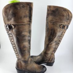 These Amazing Vince Camuto Studded Biker Boots Are In Brand New Condition. The Size Stickers Are Still On The Soles. No Box Or Tags. There Are A Few Scuffs From Storage, But Those Should Buff Out Easy. They Have An Antiqued Wear Look To Them. Size 5b/35 They Have 1 1/2" Heels, 19" Tall And Fit Calves 14" Around. Vince Camuto Studded Boots, Leather Knee-high Moto Boots With Rivets, Brown Winter Boots With Rivets, Leather Lace-up Moto Boots With Rivets, Rugged Boots With Rivets And Round Toe, Brown Boots With Rivets For Fall, Brown Fall Boots With Rivets, Fall Brown Boots With Rivets, Western Brown Boots With Rivets