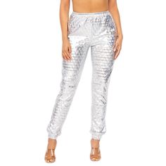 Dance, Mingle, And Shine Under The Neon Light When Partying In The High Frequency Silver Hologram Drawstring Pants From Hot & Delicious. This Ready To Party Rave Bottoms Features Full On Silver Hologram Poly-Blend Material, Two Front Pockets, And Elastic Detailing At The Waist, And Ankle. Go On And Dance As The Holographic Details Come To Life With Every Move You Make. Shine Like A Bright Star. -High Frequency Silver Hologram Drawstring Pants -92% Polyester, 8% Spandex -Hologram Poly-Blend Mater Fitted Sweatpants With Elastic Waistband, Stretch Disco Pants For Summer, Summer Stretch Disco Pants, Summer Disco Style Stretch Pants, Fitted Disco Pants For Summer, Spring Disco Trousers, Rave Bottoms, Bright Star, High Frequency