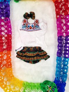 Ready to party??? Let's taco-bout it These Mexican Outfit set for baby girls are adorable. Completely handmade Embroidered Blouse ***Set includes*** Blouse Bloommer has ruffles on the back. Bow Embroidery colors will vary. Ready to ship in 1 day. We at Mexicanita Handmade truly appreciate your business, and we’re so grateful for the trust you’ve placed in us. We sincerely hope you are satisfied with your purchase if not please do not hesitate to reach out to us by e-mail mexicanitahandmade [!at] Bohemian Ruffled Sets For Festive Occasions, Festive Bohemian Ruffled Sets, Bohemian Festive Ruffled Sets, Bohemian Party Sets With Ruffles, Multicolor Ruffled Sets For Festivals, Summer Multicolor Embroidered Sets, Multicolor Bohemian Sets With Ruffles, Bohemian Multicolor Sets With Ruffles, Bohemian Multicolor Ruffled Sets