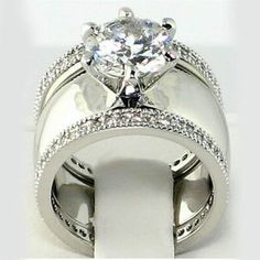 a white gold ring with diamonds on it