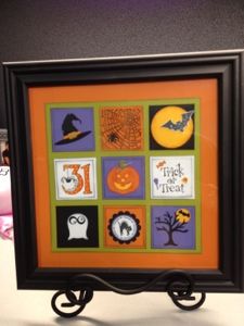 a frame with halloween pictures on it