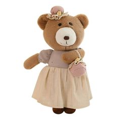 a brown teddy bear wearing a dress and shoes