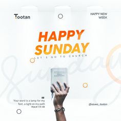 a person holding up a book with the words happy sunday written on it in orange and white