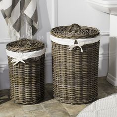 two wicker baskets sitting next to each other