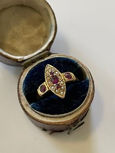 Antique marquise shaped seed pearl and natural ruby ring. The ring has 18ct marked inside but rubbed. The ring can be sized but is a size 5 at the moment. Natural Ruby Ring, Marquise Ring, White Gold Bracelet, Seed Pearl, Multi Stone Ring, Ruby Ring, Natural Ruby, Gold Engagement Rings, Diamond Pendant