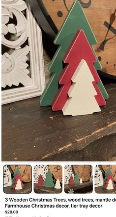 a wooden christmas tree sitting on top of a table