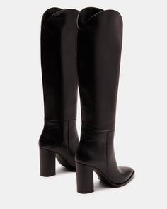 A pointed toe and curved topline give the BIXBY block heel knee boot a Western edge while the sleek upper highlights the clean monochrome look Point toe block heel knee boot Slip-on style Curved topline 3.5 inch heel height Size 6 measurements: 15.5 inch shaft circumference, 14.25 inch shaft height Size 8 measurements: 16 inch shaft circumference, 15 inch shaft height Size 10 measurements: 17 inch shaft circumference, 15.5 inch shaft height Leather upper material Synthetic and textile lining Syn Sleek Tall Boots With High Shaft, Sleek Tall High Shaft Boots, Knee-high Boots With Sculpted Heel, Sleek Knee-high Boots With Stacked Heel, Sleek Wide Calf Heeled Boots With High Shaft, Sleek Fall Knee-high Boots With High Shaft, Heeled Boots With Stacked Heel And High Shaft, Classic Wide Calf Knee-high Boots With Stacked Heel, Classic Knee-high Boots With Block Heel