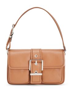 cognac brown leather smooth grain silver-tone buckle detail foldover top with magnetic fastening adjustable shoulder strap slip pocket to the rear partitioned compartment internal patch pockets internal slip pocket silver-tone hardware full lining Classic Flap Bag With Buckle Closure, Luxury Brown Shoulder Bag With Buckle Closure, Classic Formal Shoulder Bag With Buckle Closure, Classic Michael Kors Bags With Silver-tone Hardware, Leather Flap Bag With Buckle Closure, Modern Leather Satchel With Buckle Closure, Leather Work Bag With Buckle Closure, Leather Bag With Buckle Closure And Flap, Leather Bag With Buckle Closure For Work