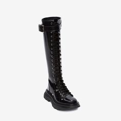 Description:Bound to be an androgynous addition to your shoe portfolio. this pair of black boots will toughen up your ensemble with military finishing touch. With the polished look of high-end patent leather. they have a classic rounded toe upper set on durable rubber soles fully constructed with grippy tread for a practical reason. Punctuated with silver toned eyelet hardware that lines the shaft. they come with a full inside zip fastening along the almost knee length silhouette with a wide strap and metal buckle for double security. The sleek shoes are ready to take you out and ensure a confident strutting whenever you're heading. EU US CM 35 4 22.1 36 5 22.8 37 6 23.5 38 7 24.2 39 8 24.8 40 9 25.5 41 10 26.2 42 11 26.8 43 12 27.5 Edgy Leather Knee-high Combat Boots, Edgy Knee-high Leather Combat Boots, Edgy Knee-high Combat Boots With Lug Sole, Alternative Black Knee-high Boots For Fall, Alternative Style Black Knee-high Boots For Fall, Black Knee-high Combat Boots With Lug Sole, Leather Gothic Knee-high Combat Boots, Black Alternative Combat Boots For Fall, Alternative Style Black Knee-high Boots With Round Toe