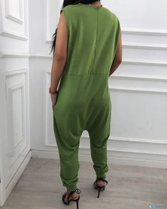 OrcaJump - Contemporary Sleeveless Jumpsuit with V-Neck and Convenient Pocket Design Solid Color V-neck Jumpsuits And Rompers For Leisure, Green V-neck Casual Jumpsuits And Rompers, Green Sleeveless Casual Jumpsuit, Sleeveless Stretch Jumpsuits And Rompers For Leisure, Casual Green Stretch Jumpsuits And Rompers, High Neck Jumpsuit, Jumpsuit Chic, Special Clothes, Orange Fashion