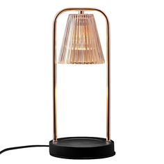 a table lamp with a black base and a light shade on it's side