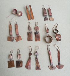 Dirty copper collection, Flame patina long copper earrings Collection of earrings that have an organic look thanks to handshaping soft copper after heating.  Flame patina on copper varies from dark brown to orange with many shades in between. It is such a pleasure watching the copper change the color while heating, and while cooling down.  The outcome is always a surprise! All the pieces were handcut and joined with copper wire balled at ends. That way, all the parts are moovable. There are 8 pa Jewelry Homemade, Rivet Jewelry, Hard Crafts, Cold Connections, Copper Earrings Handmade, Copper Collection, Silversmithing Jewelry, Organic Earrings, Autumn Jewelry