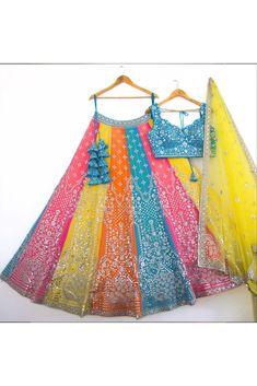 This Lehenga Choli is Ready to Wear Experience elegance and eye-catching style with our Multi color Sequence & Thread Embroidery work Designer Lehenga Choli. Perfect for any party or special occasion, this exquisite piece will make you stand out with its stunning design and intricate detailing. Elevate your wardrobe with this must-have ensemble today. Lehenga:- Shadding Faux Georgette Fabric With Sequence Thread Work Blouse:- Faux Georgette Fabric With Sequence & Thread Work Dupatta:- Net Fabric with Embroidery work & Lace Border Color Multi Fabric Faux Georgette Occasion Party Wear Wedding Wear Work Sequence & Thread Embroidery Chest Size 38 Lehenga Length 42 Please note: Note:- Originally Stitched in 38 but can alter for size 36 & 40 without any extra cost. "This lehenga blouse comes wit Anarkali Fitted Set With Multicolor Embroidery, Festive Gown With Multicolor Intricate Embroidery, Multicolor Anarkali Gown With Intricate Embroidery, Fitted Lehenga With Multicolor And Resham Embroidery, Fitted Lehenga With Resham And Multicolor Embroidery, Multicolor Embroidered Gown With Dupatta For Reception, Festive Gown With Multicolor Embroidery And Zari Work, Bollywood Gown With Multicolor Embroidery And Dupatta, Festive Multicolor Embroidered Gown For Reception