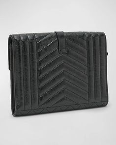 Saint Laurent pouch clutch bag in quilted leather.Features signature YSL logo lettering.Detachable wristlet strap, 5.5'L.Can be worn as a wristlet or clutch bag.Envelope flap top with magnetic closure.Interior, one slip pocket.Bronze hardware.Approx. 6.2'H x 8.2'W.Made in Italy Luxury Black Quilted Wallet On Chain, Formal Quilted Clutch, Luxury Quilted Clutch For Formal Occasions, Luxury Quilted Clutch For Formal Events, Luxury Black Quilted Wallets, Formal Quilted Rectangular Clutch, Quilted Rectangular Wallets For Evening, Quilted Rectangular Evening Wallets, Designer Clutch Wallet For Everyday Use