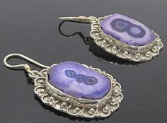 "925 Sterling Silver - Vintage Purple Agate Swirl Border Dangle Earrings - EG2986  925 Sterling Silver - Vintage Purple Agate Swirl Border Dangle Earrings - EG2986  Jewelry Type:         Earrings   Metal Type:            925 Silver   Metal Size:             1.5\"  Stone Type:            Agate   Condition:              N/A  Jewelry Weight:     10.7 Grams  PLEASE NOTE: THIS ITEM IS PRE-OWNED. ALTHOUGH MOST ITEMS ARE IN VERY GOOD CONDITION, SOME MAY NEED CLEANING AND/OR MINOR REPAIRS. WE MAKE A VER Swirl Border, Purple Agate, Earrings Metal, Vintage Purple, Antique Rings, Beautiful Necklaces, Types Of Metal, Swirl, Metallic Silver