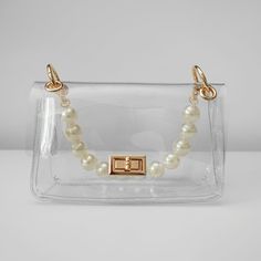 Beautiful And Chic Small Purse That Goes Perfect With Any Outfit. Brand New Color: Clear With Gold And Pearl Accents Size: 8.5x5x3 Elegant Crossbody Bag With Clear Strap, Elegant Crossbody Shoulder Bag With Clear Strap, Elegant Bag With Clear Strap For Daily Use, Elegant Bags With Clear Strap For Daily Use, Elegant Clear Bag For Daily Use, Elegant Rectangular Shoulder Bag With Clear Strap, Elegant Shoulder Bag With Clear Strap, Elegant White Bag With Clear Strap, Elegant White Bags With Clear Strap