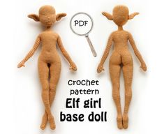 the doll is made out of yarn and has a magnifying glass in front of it