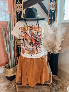 All things western. This tee is perfect for any rodeo during any season! Crew Neck | Short Sleeve | Unisex Fit Bella Canvas Material: 100% CottonSmall (2/4) | Medium (6/8) | Large (10/12) | XL (14/16) | 2XL (18/20) Country Western, Good Stretches, Pet Hair, Canvas Material, Online Purchase, Rodeo, Florence, Bella Canvas, Camel