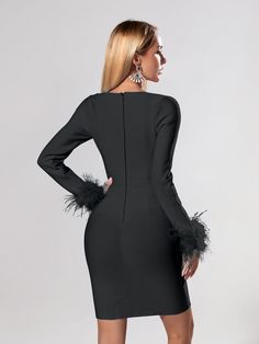 Vibrant and luxurious, the Candace Bandage Long Sleeve Feather Dress will turn heads. Crafted from a high-quality black bandage fabric and featuring a sweetheart neckline, this mini dress will add a touch of class and glamour to any event. The added feather detailing on the sleeves adds a subtle, sophisticated flair making it perfect for evenings out or special occasions. Material: Nylon, Spandex Elasticity: High Stretch Closure Type: zipper Elegant Mini Bandage Dress For Club, Elegant Knee-length Bandage Dress For Club, Elegant Mini Dress For Club, Elegant Club Mini Dress, Elegant Sheath Mini Dress For Club, Elegant Club Mini Dress With Feather Trim, Elegant Winter Club Dresses, Elegant Club Dress For Winter, Elegant Black Mini Dress For Club