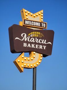 a sign that says welcome to marcu bakery