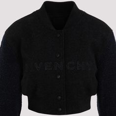 Givenchy Charcoal Dark Grey Wool Jacket. Crafted in wool and polyamide blend. Stand-up collar, v-neck, front buttoned fastening, front tonal lettering logo, long sleeves, ribbed cuffs and hem, straight hem, cropped design. Long Sleeve Varsity Jacket With Logo Detail For Winter, Black Outerwear With Embroidered Logo For Fall, Wool Outerwear With Embroidered Logo And Long Sleeves, Wool Outerwear With Embroidered Logo, Black Varsity Jacket With Buttons For Winter, Winter Workwear Outerwear With Embroidered Logo, Classic Fall Outerwear With Logo Detail, Classic Fall Outerwear With Logo, Winter Varsity Jacket With Padded Collar