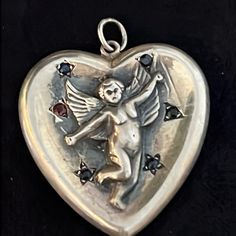 In Good Condition With Light Wear From Use. Stamped Sterling On Back. Repousse Style. Cupid Heart, Jewelry Antique, Sterling Jewelry, Emerald Stone, On Back, Heart Pendant, Womens Jewelry Necklace, Emerald, Sapphire